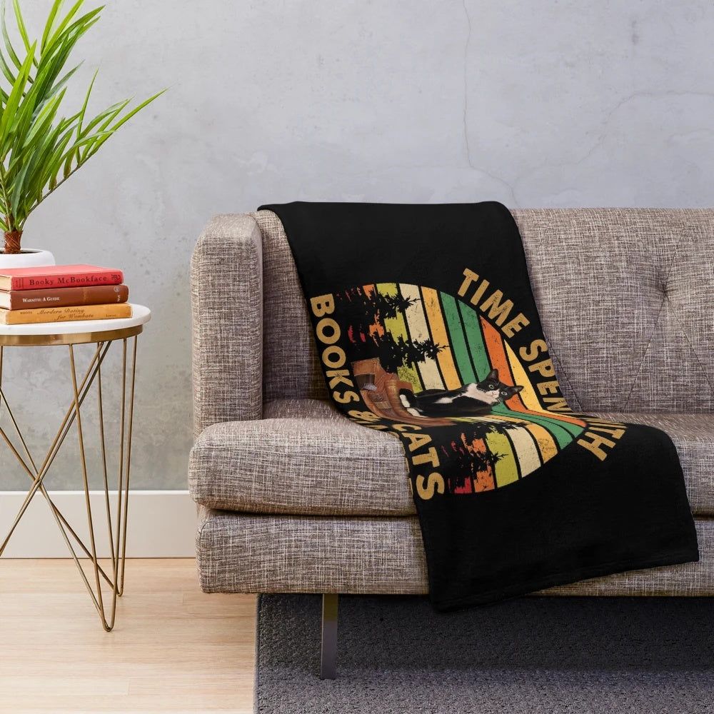 Vintage plush blanket with books and cats design