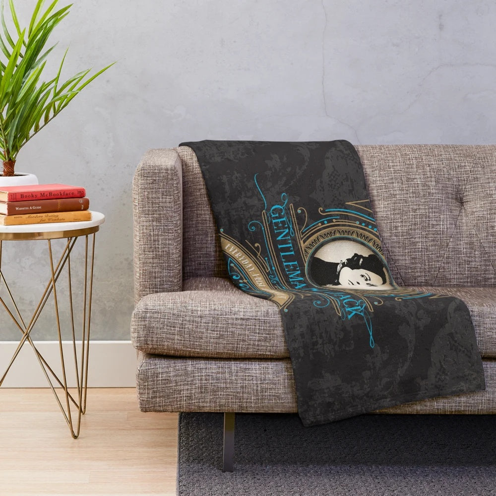 Vintage-inspired plush blanket featuring the Gentleman Jack emblem