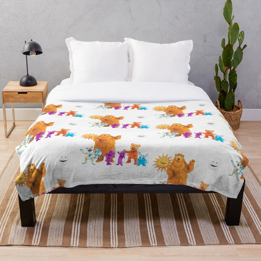 Soft and cuddly plush blanket with a vintage-inspired cartoon bear design