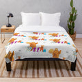 Soft and cuddly plush blanket with a vintage-inspired cartoon bear design