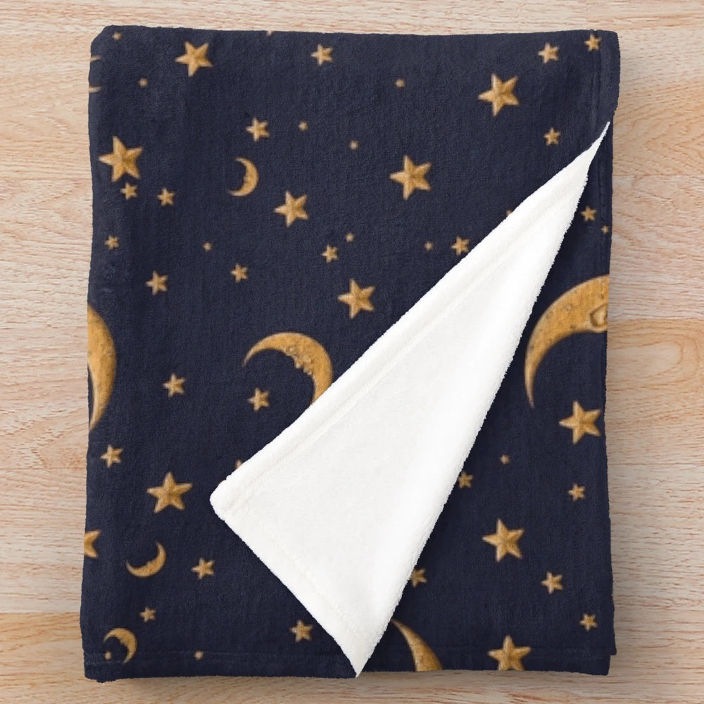 Vintage-style plush blanket with moon and stars design