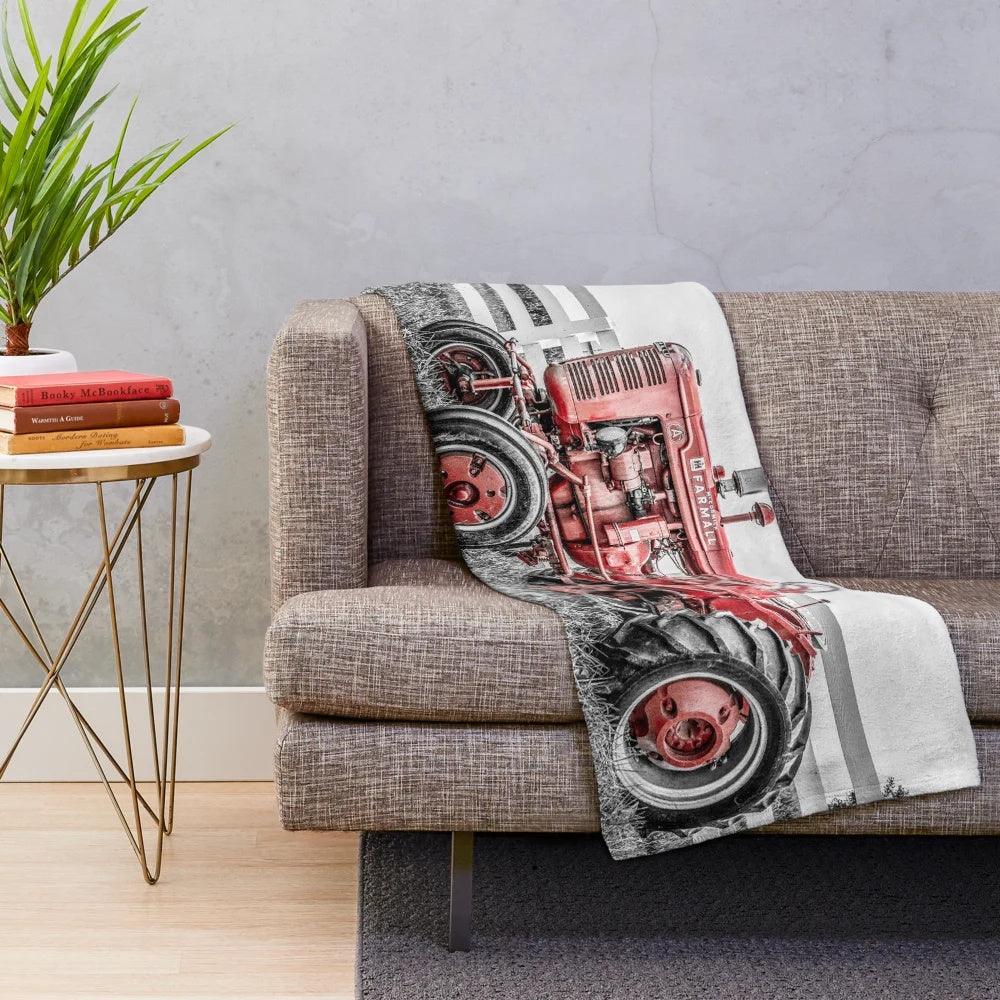Plush blanket featuring a vintage tractor design for farm and country home decor