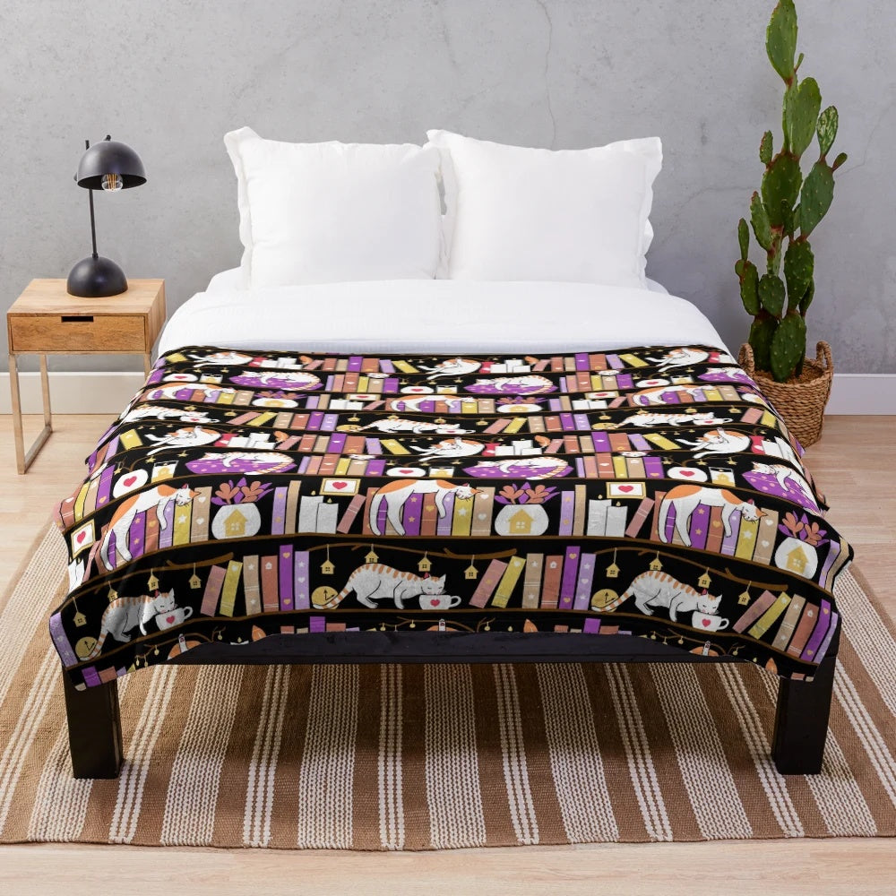 Violet plush blanket with a cute cat design, perfect for a cozy reading nook