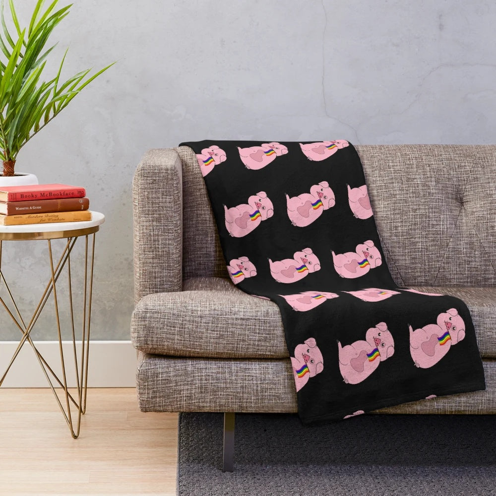 Soft and cuddly Waddles Pride plush blanket with rainbow colors