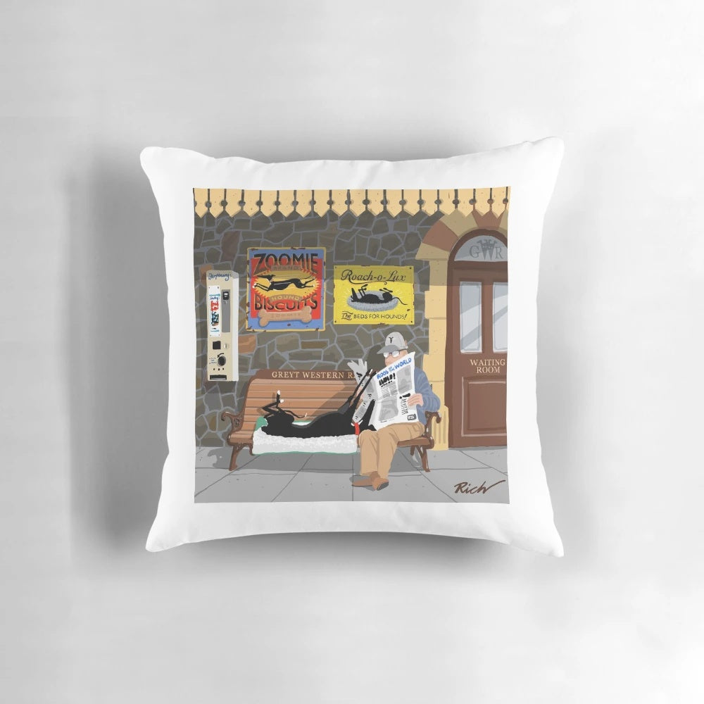 Plush waiting pillow featuring a greyhound dog and steam train design