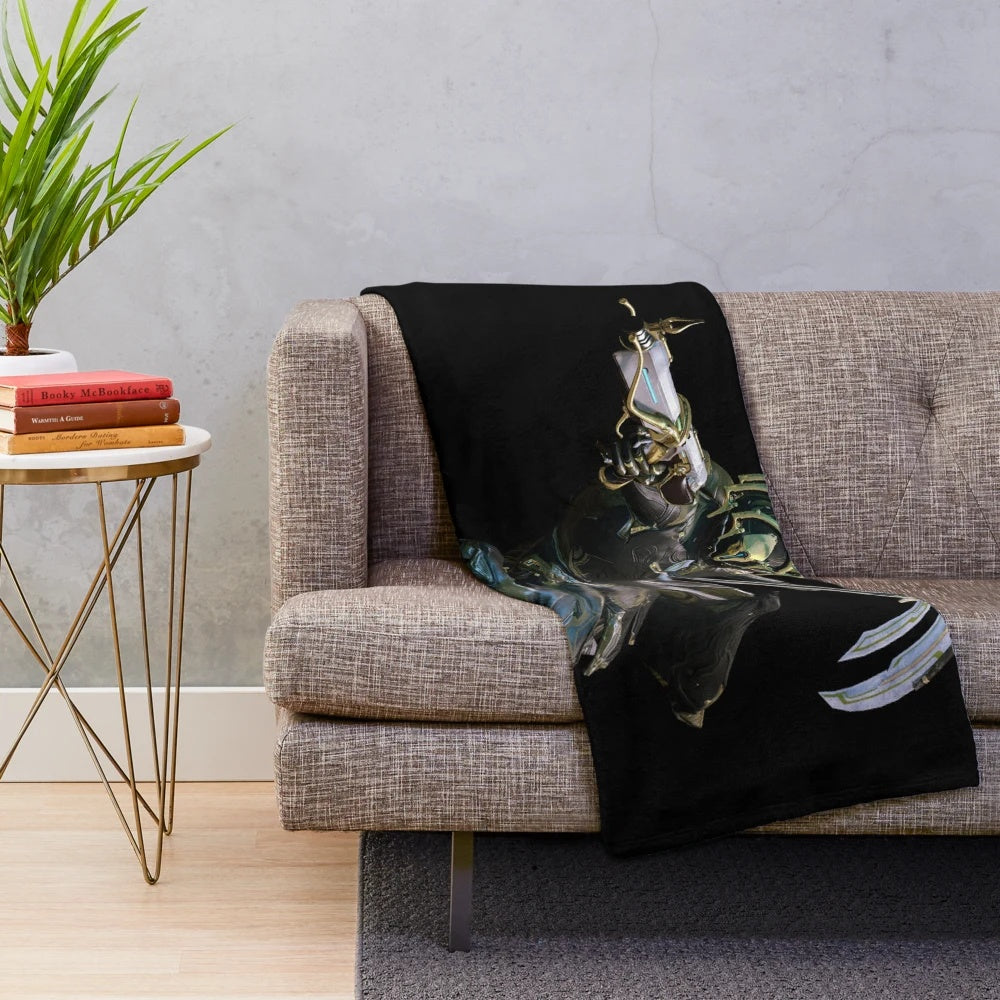 Warframe-themed plush blanket featuring the iconic Warframe logo and design