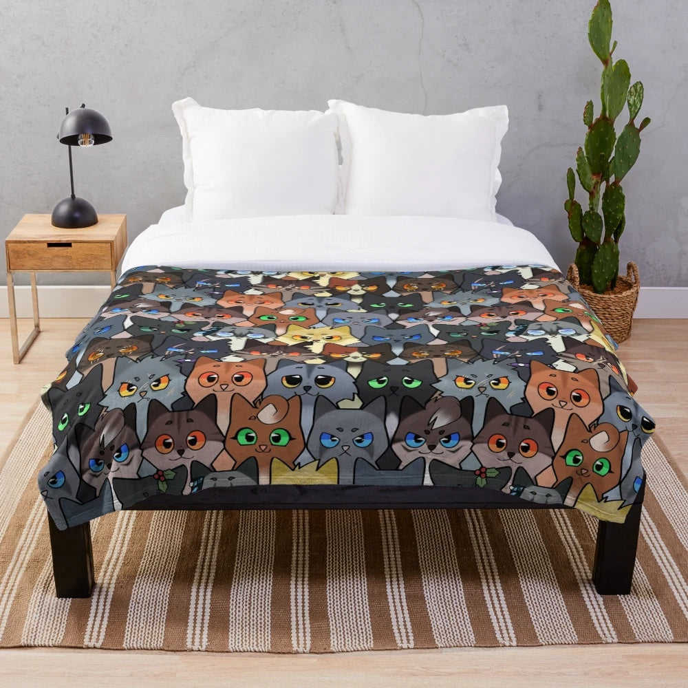 Soft and cuddly plush blanket featuring a repeating pattern of warrior cat characters