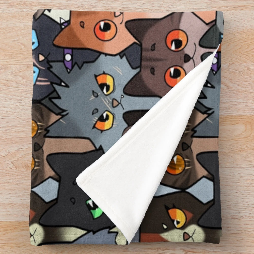 Soft and cuddly plush blanket featuring a repeating pattern of warrior cat characters