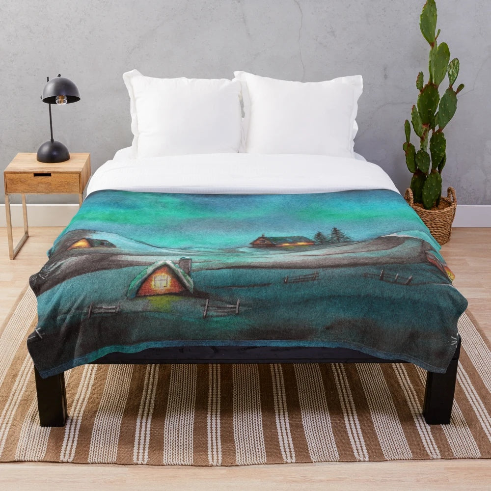 Cozy plush blanket featuring a watercolor winter landscape with northern lights