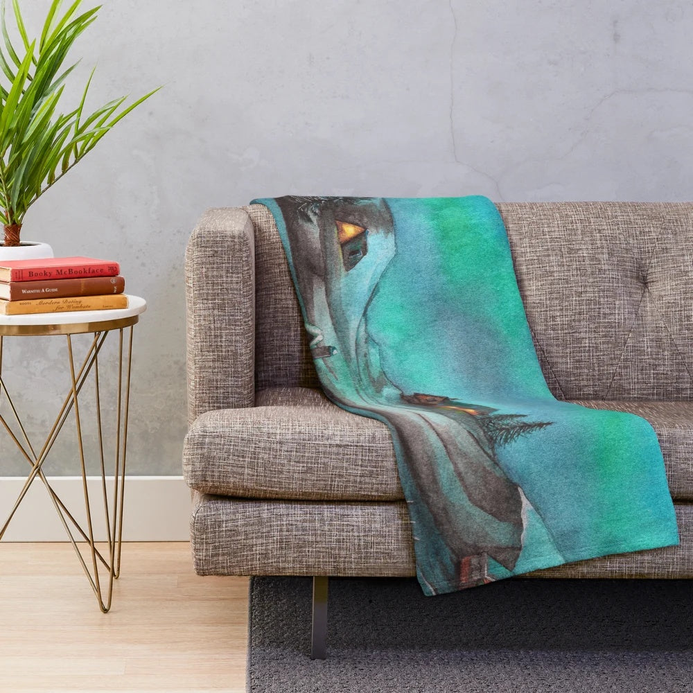 Cozy plush blanket featuring a watercolor winter landscape with northern lights