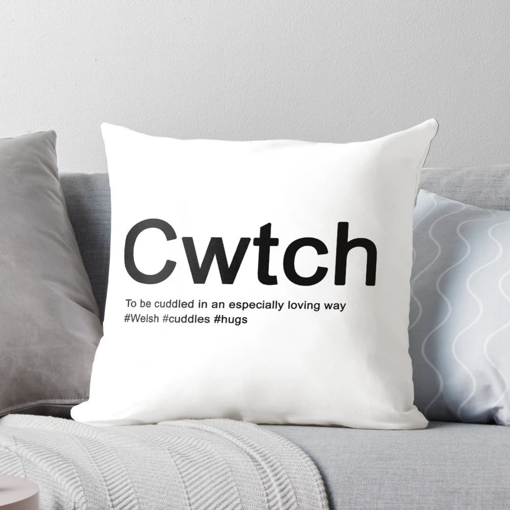 Cozy pillow featuring the Welsh word "cwtch" and other soothing words