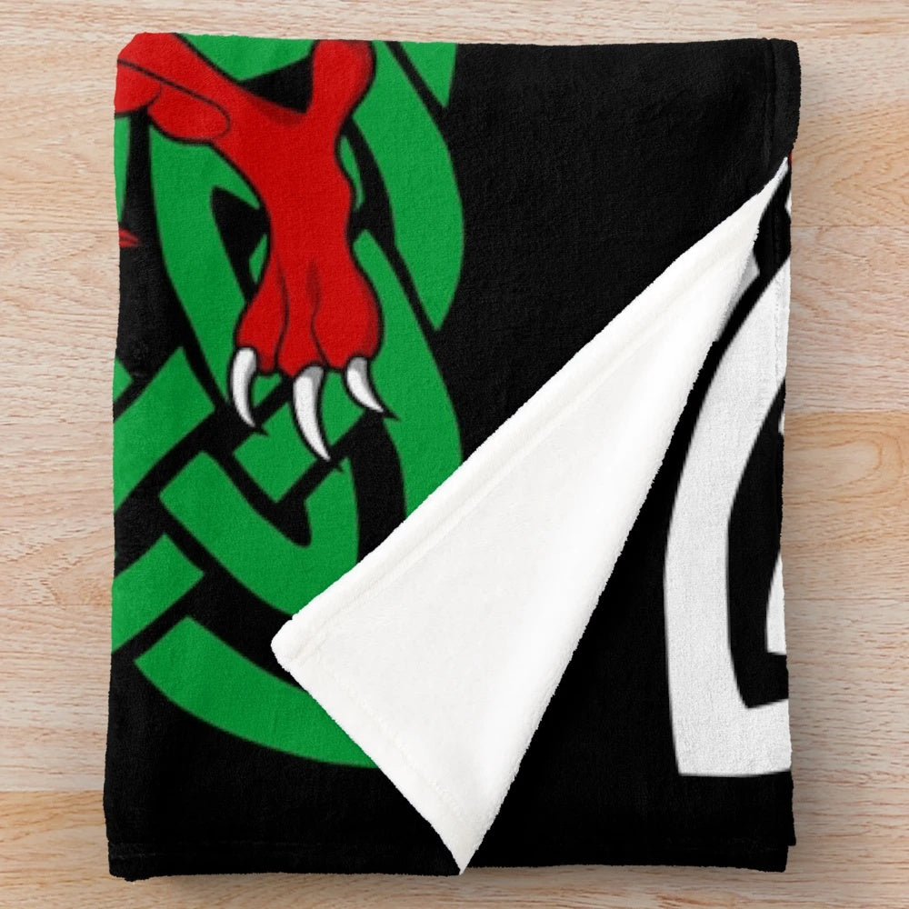 Cozy plush blanket featuring a vibrant Welsh dragon design