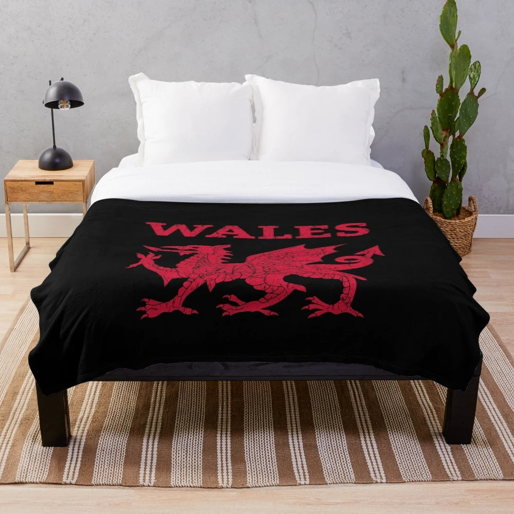 Soft and cozy plush blanket featuring a majestic Welsh red dragon design