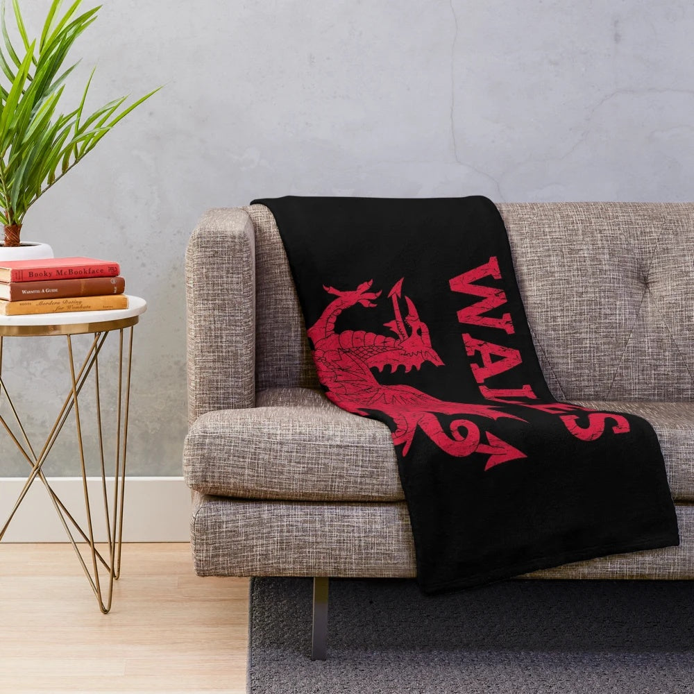 Soft and cozy plush blanket featuring a majestic Welsh red dragon design