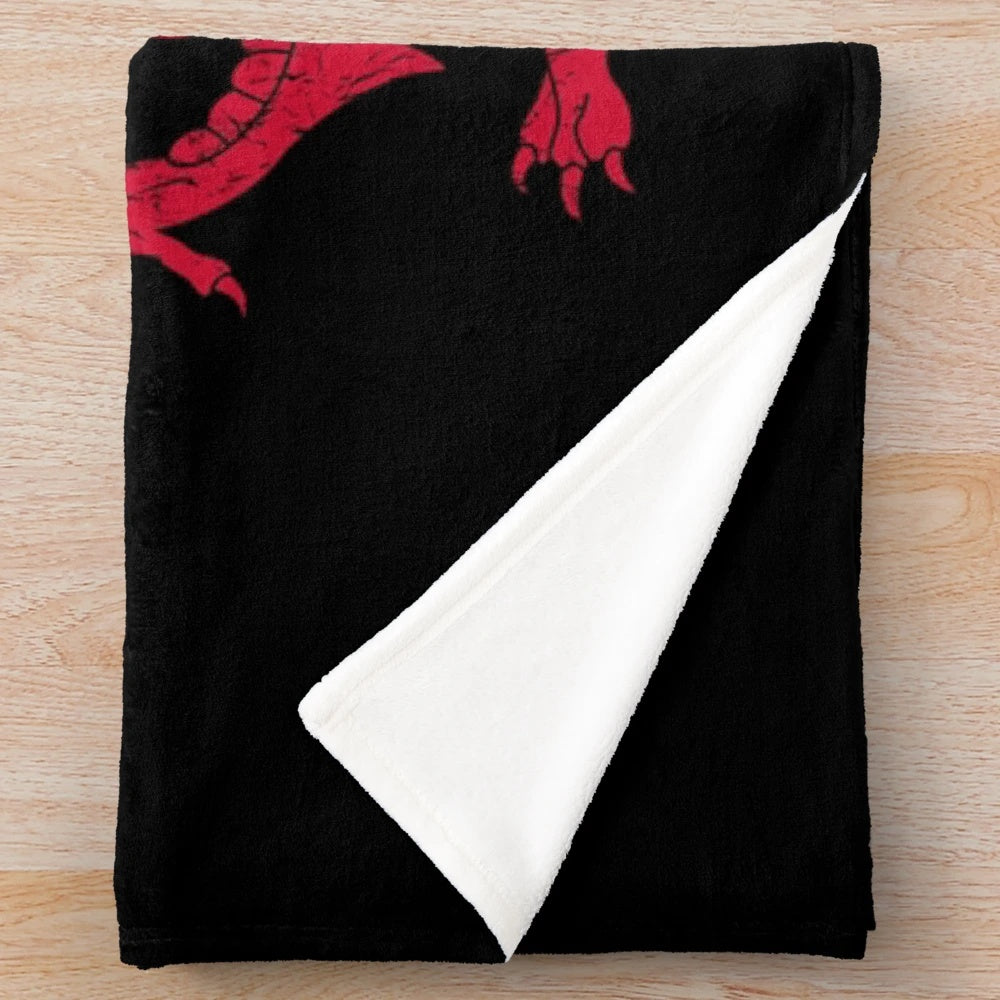 Soft and cozy plush blanket featuring a majestic Welsh red dragon design