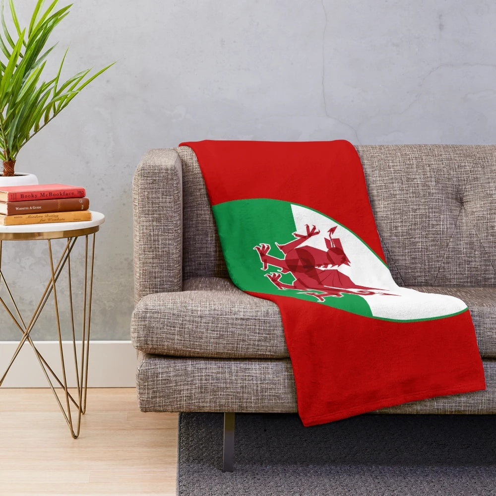 Plush blanket featuring the Welsh rugby team's iconic red dragon symbol