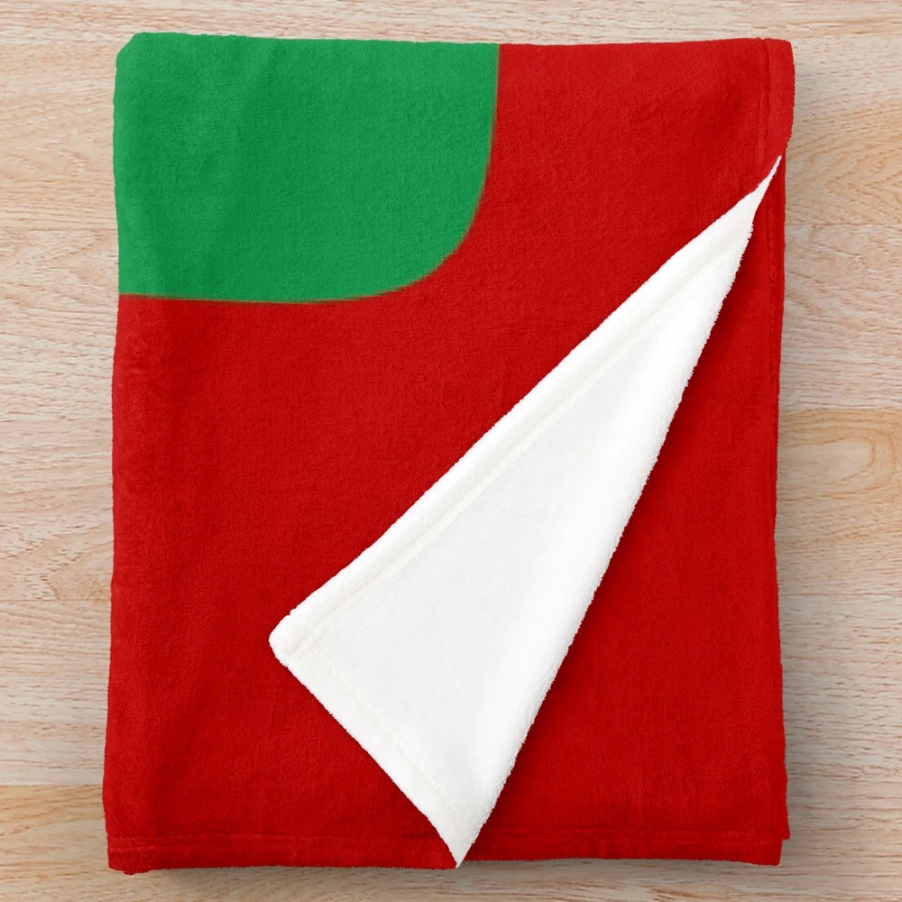 Plush blanket featuring the Welsh rugby team's iconic red dragon symbol