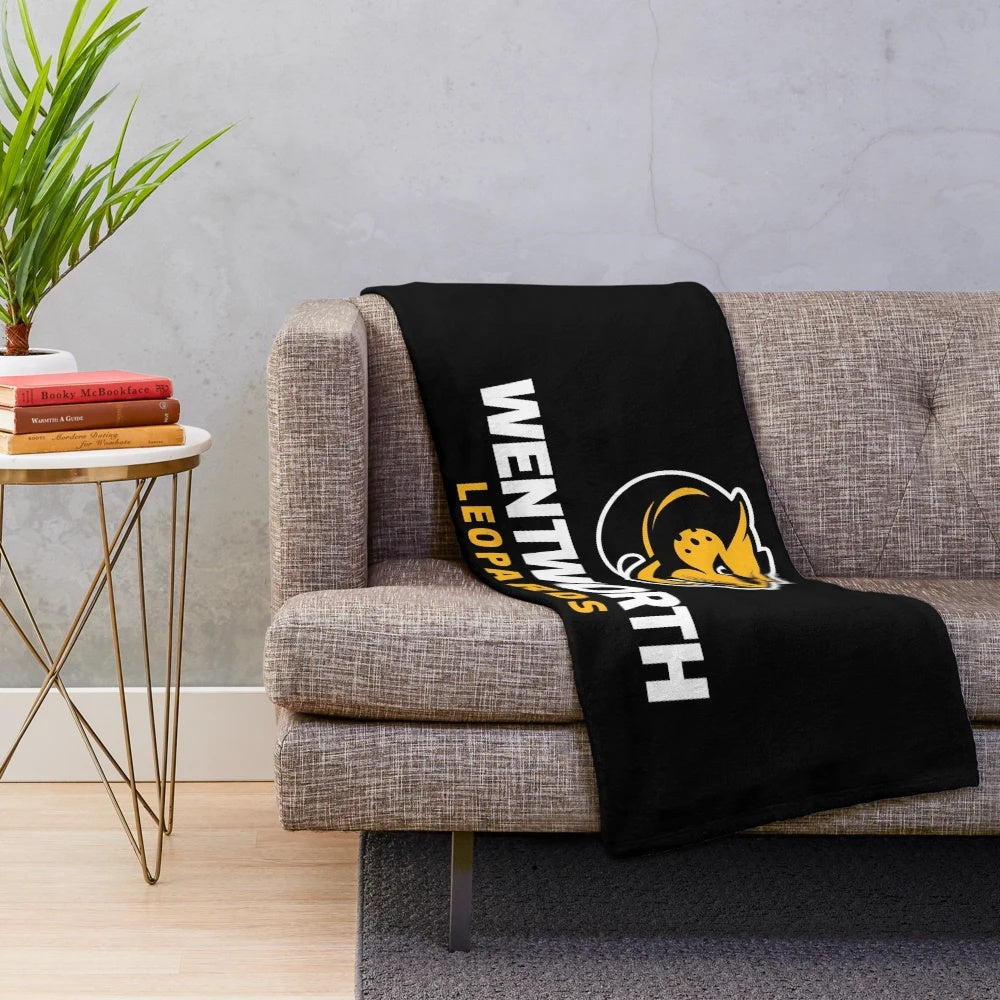 Wentworth Institute of Technology plush blanket featuring the school's logo and colors