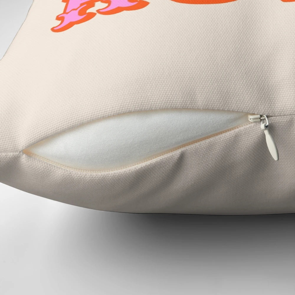 Soft, pink pillow with "Howdy" text, perfect for adding a touch of Texas charm to any room.
