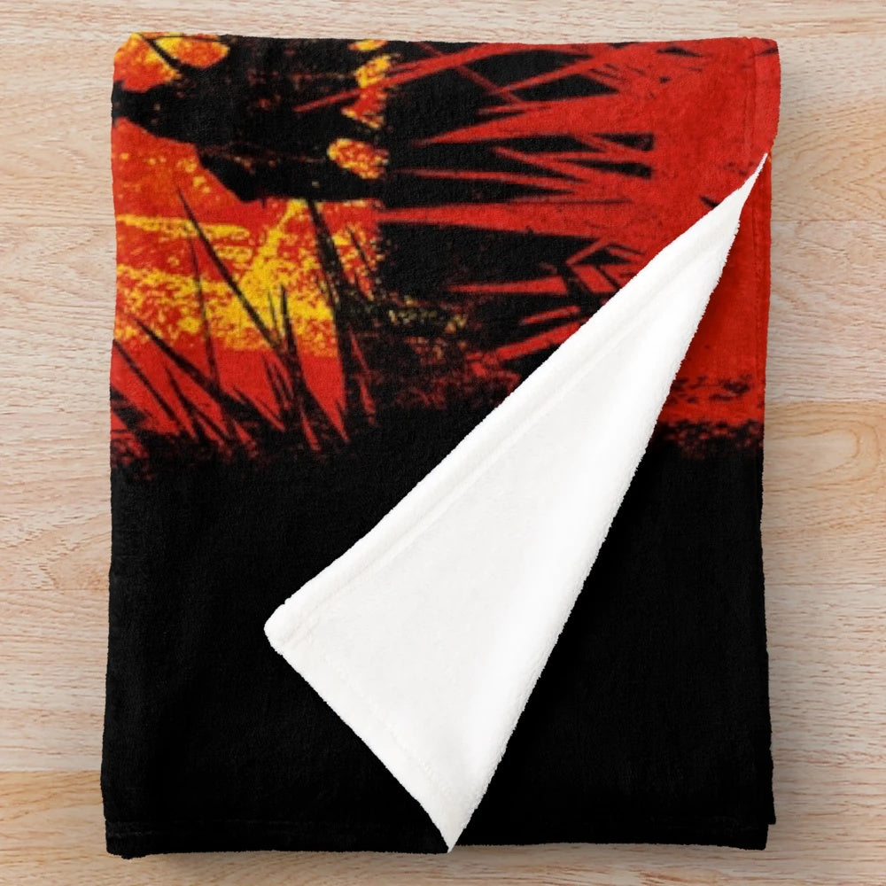 Red Dead Redemption-themed plush blanket with cowboy and sunset design