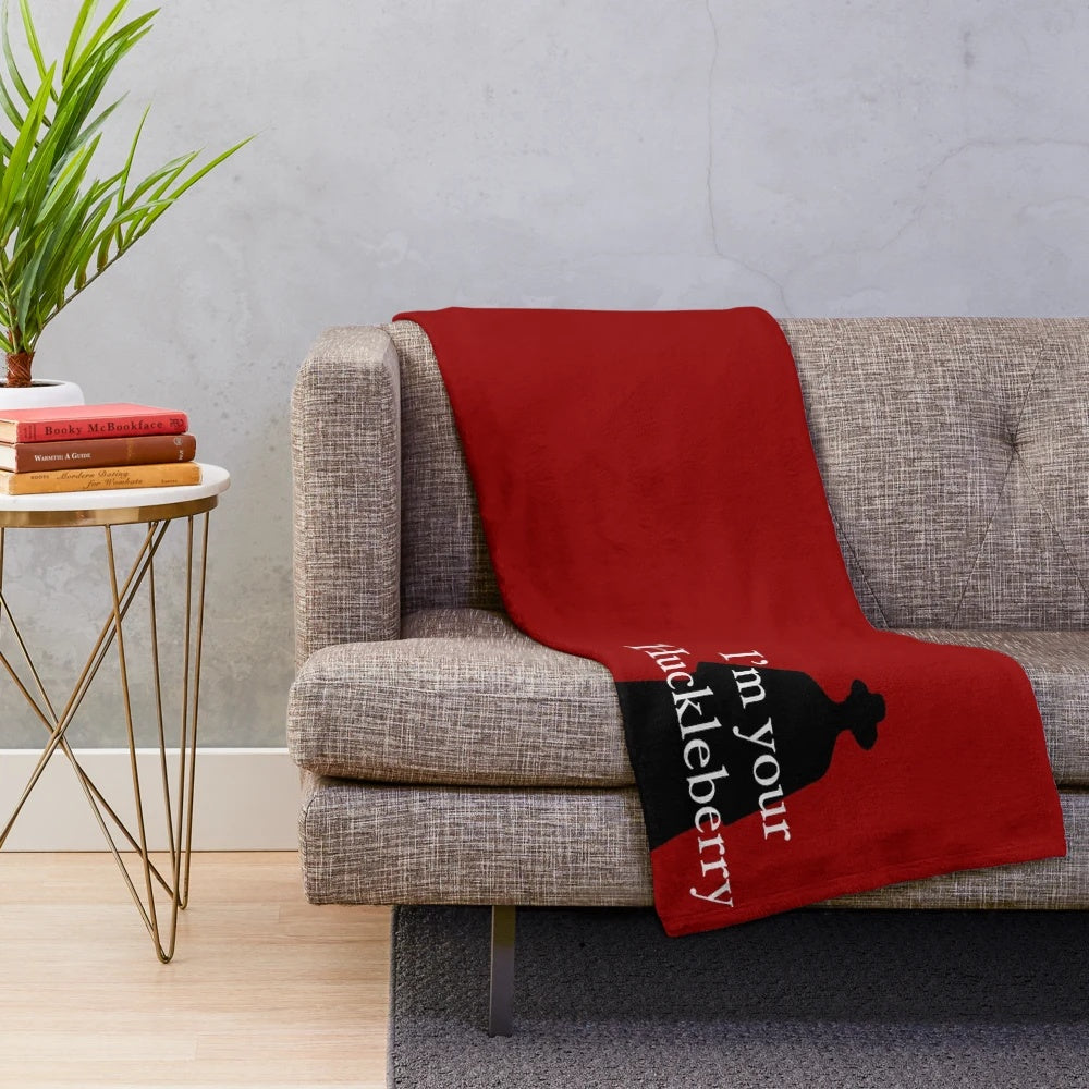Western-themed plush blanket with huckleberry design