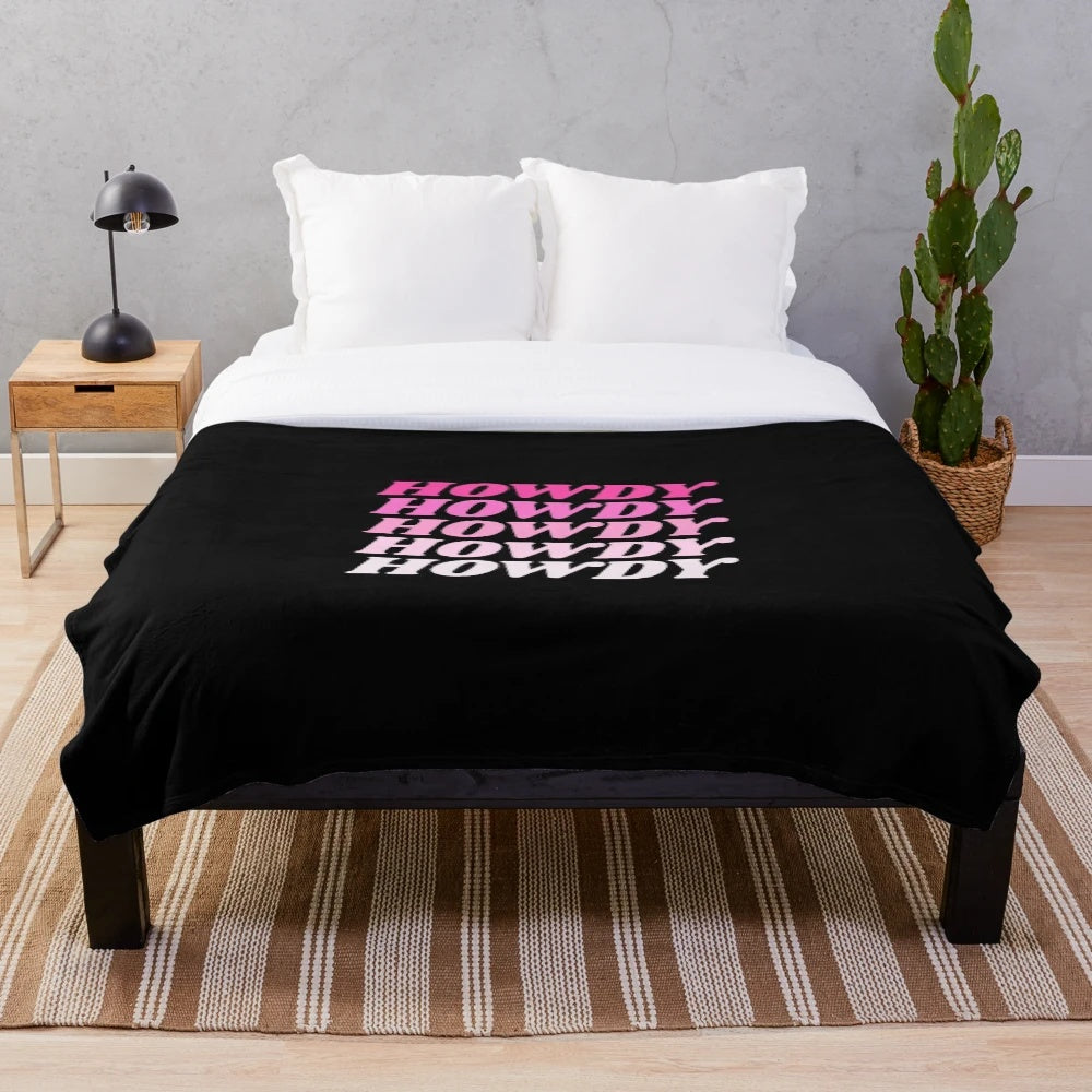 Cozy western-themed plush blanket with a cowboy and country design