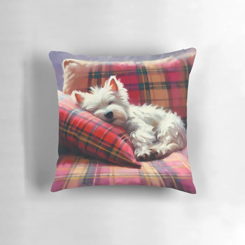 Adorable west highland terrier dog sleeping peacefully on a tartan patterned pillow