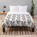 Soft and plush Westies-patterned blanket for cozy holiday snuggling
