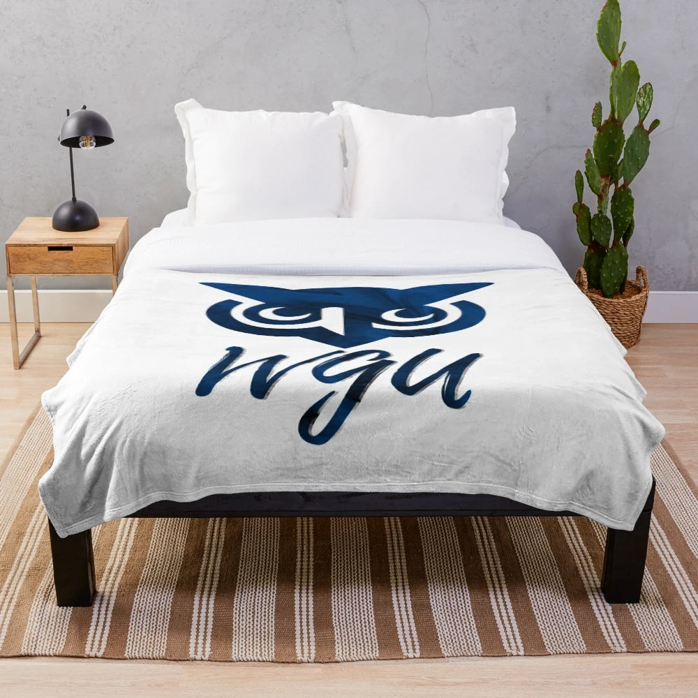 Soft and comfortable plush blanket featuring the Western Governors University (WGU) logo and design
