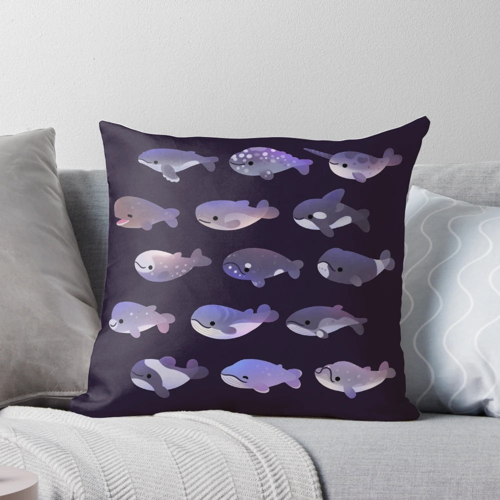 Soft and plush whale-themed pillow featuring various marine animals