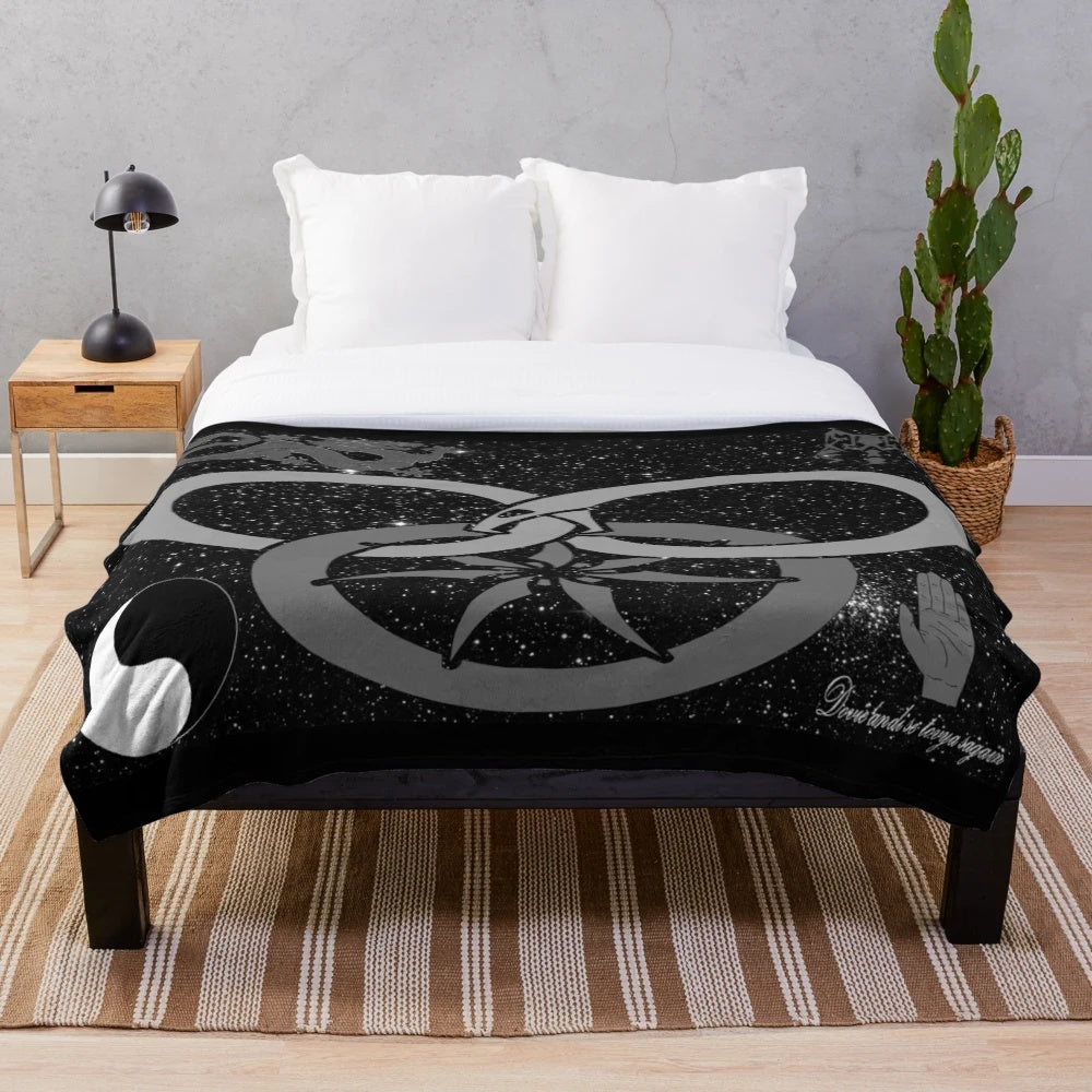 Wheel of Time-themed black and white plush blanket featuring telaranrhiod and other iconic symbols