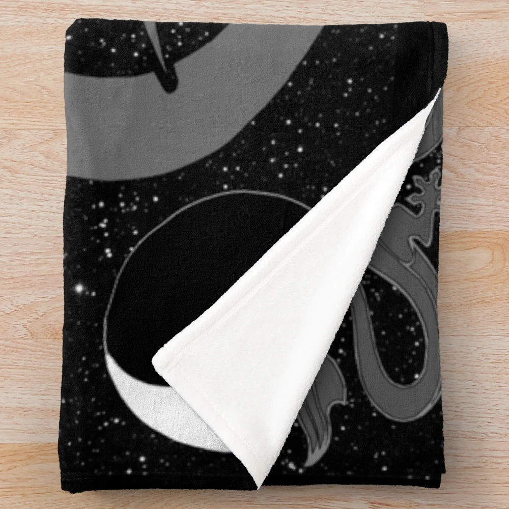 Wheel of Time-themed black and white plush blanket featuring telaranrhiod and other iconic symbols