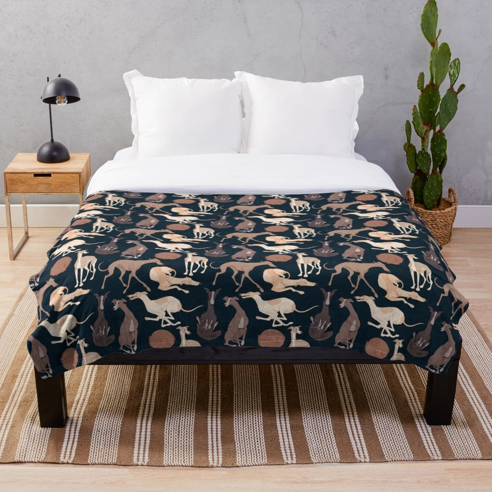 Whippet plush blanket with a soft, cozy animal print design