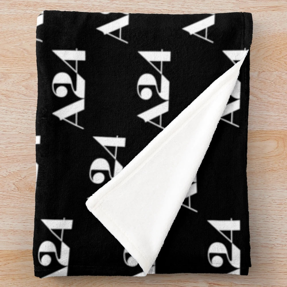 White A24 logo plush blanket for movie enthusiasts