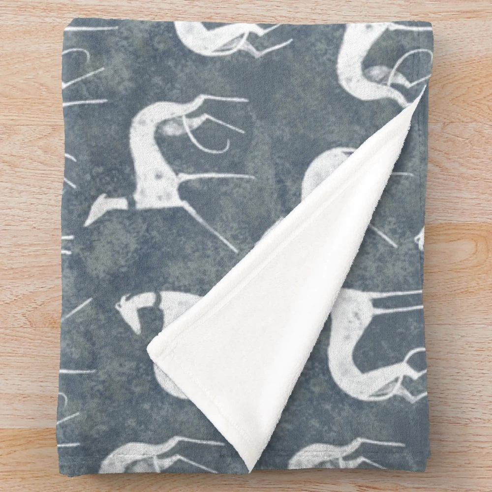 White plush blanket featuring a sighthound dog breed design