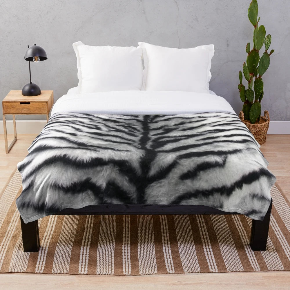 White tiger print plush blanket with graphic animal skin pattern
