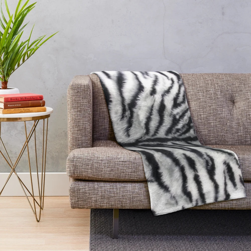 White tiger print plush blanket with graphic animal skin pattern