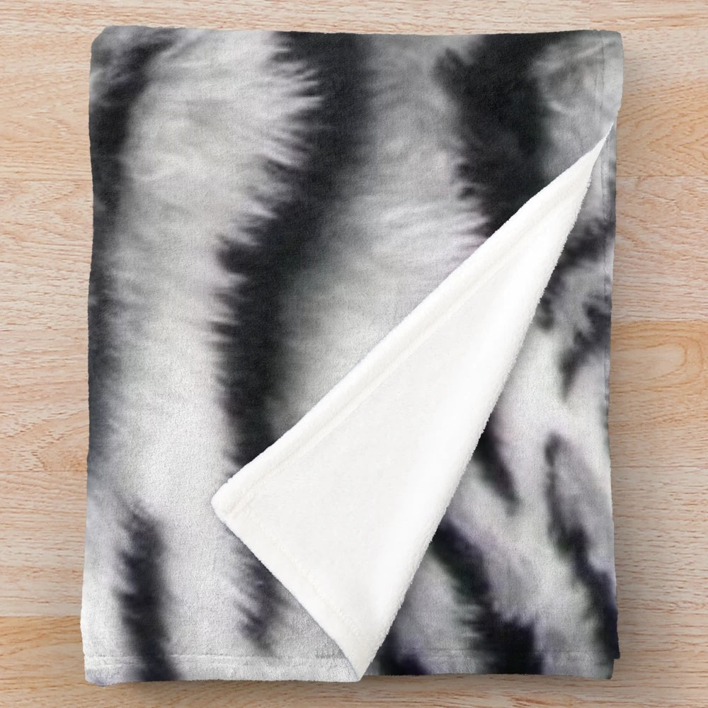White tiger print plush blanket with graphic animal skin pattern