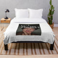 Wilbur Soot plush blanket with cozy, soft design