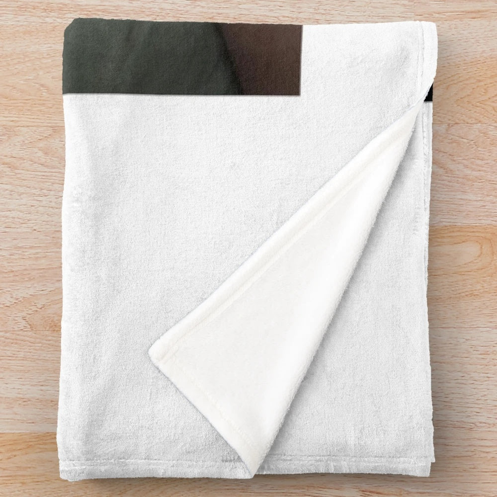Wilbur Soot plush blanket with cozy, soft design