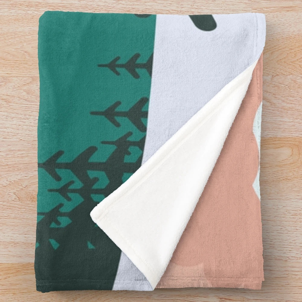 Plush blanket featuring a winter landscape with a bus in the woods