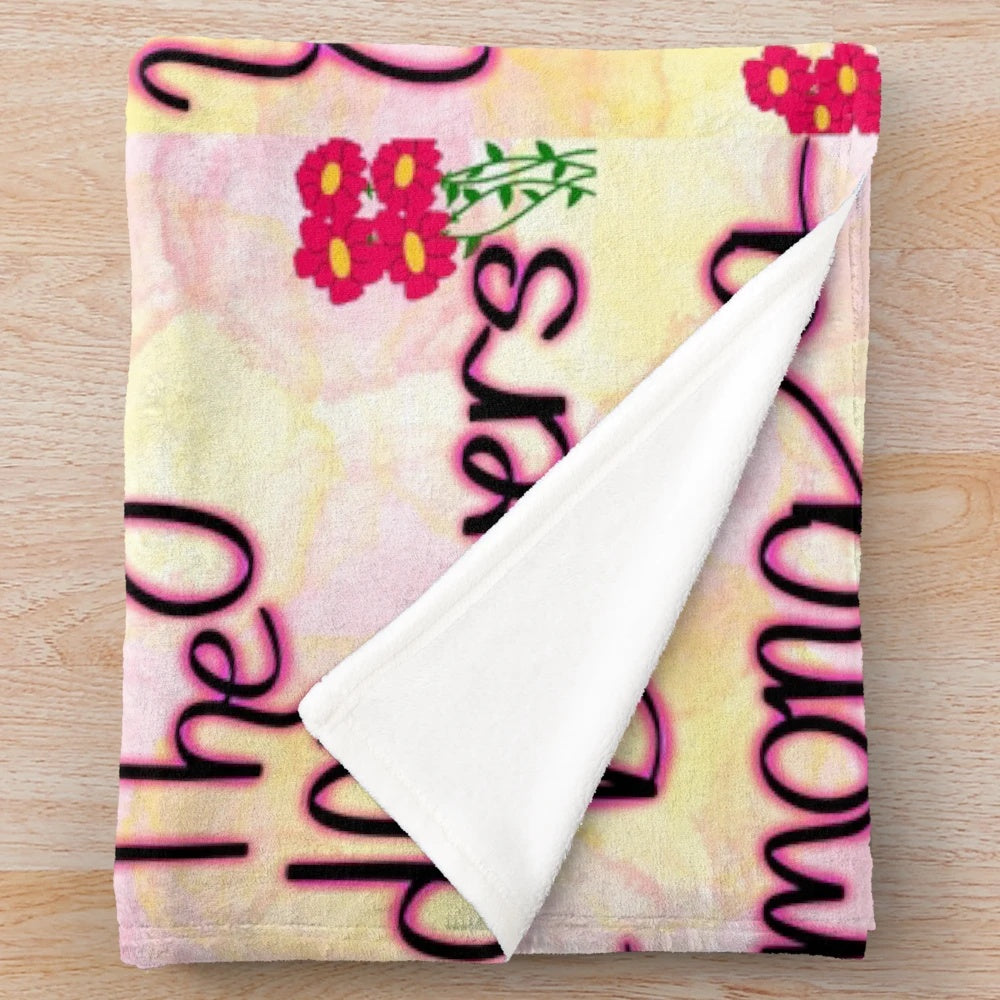Soft and cozy plush blanket with a beautiful wildflowers design