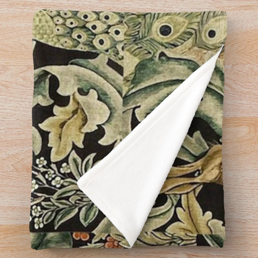 Plush blanket featuring a William Morris inspired forest and floral pattern