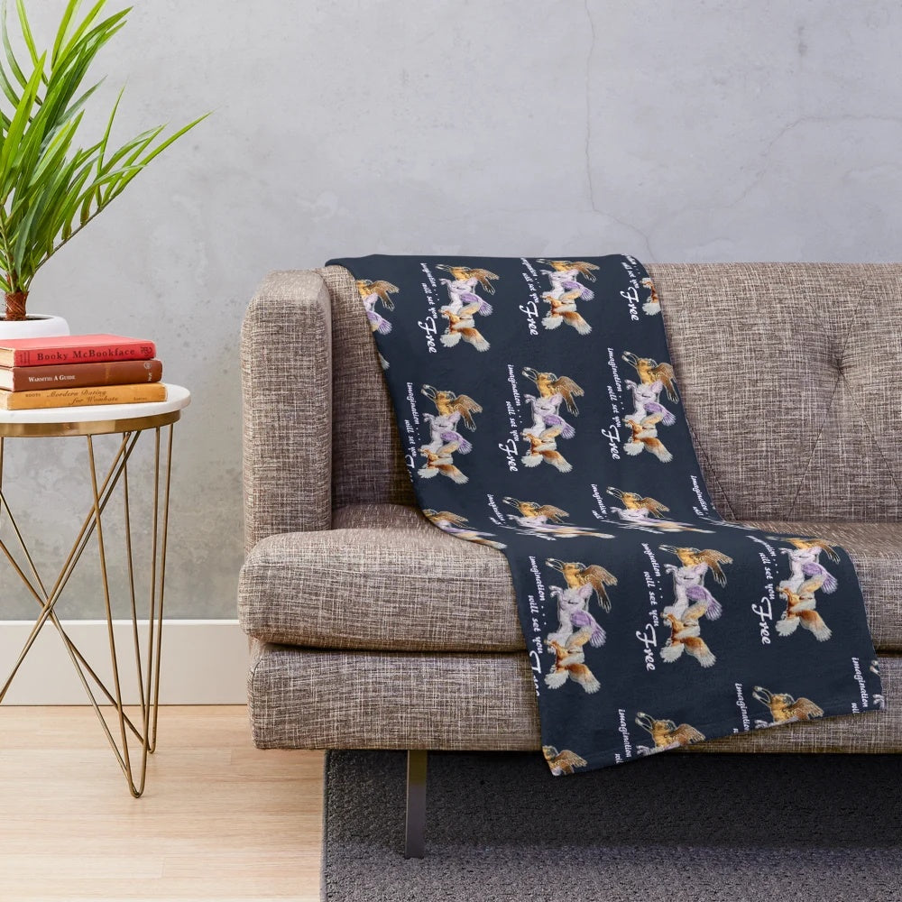 Plush blanket featuring a winged horse design