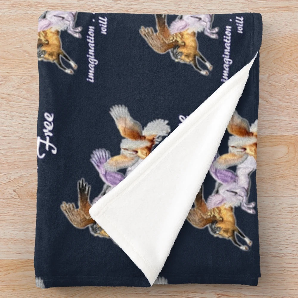 Plush blanket featuring a winged horse design