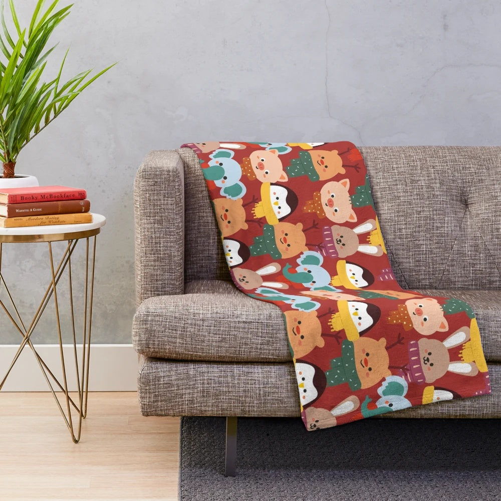 Plush blanket with black and white winter animal print design