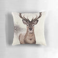 Decorative winter deer pillow with snowy, seasonal design