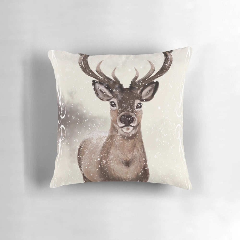Decorative winter deer pillow with snowy, seasonal design