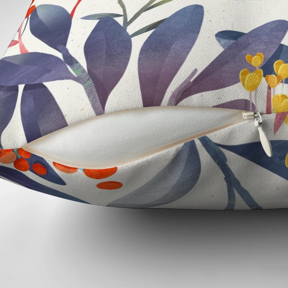 A close-up image of a plush, decorative winter pillow featuring a delicate floral and botanical design in shades of blue and beige.