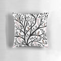 Decorative throw pillow featuring a tranquil winter forest scene with birds and berries in black, red, and white.